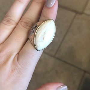 White and gold ring